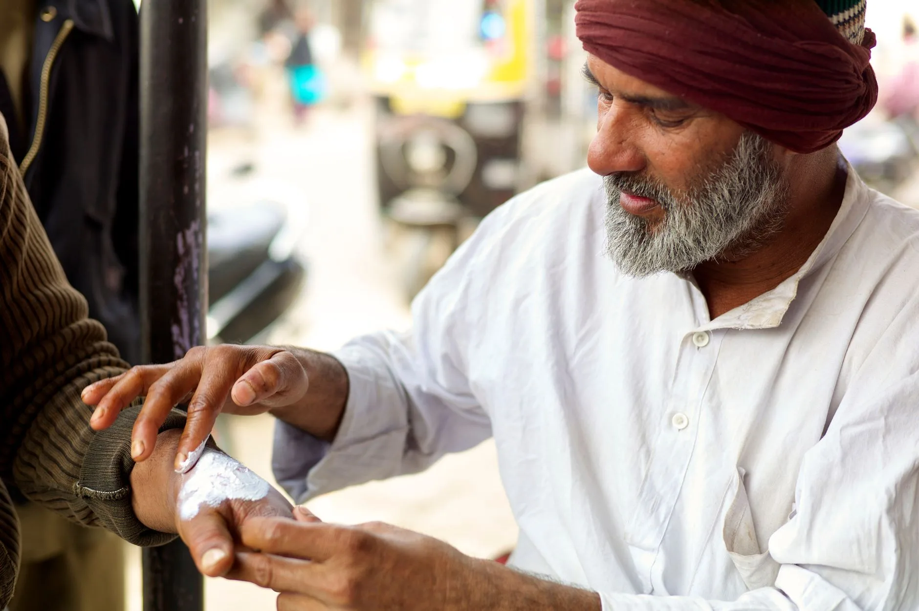Colorful Rajasthan street scene with historic fort, bustling market, and vibrant textiles