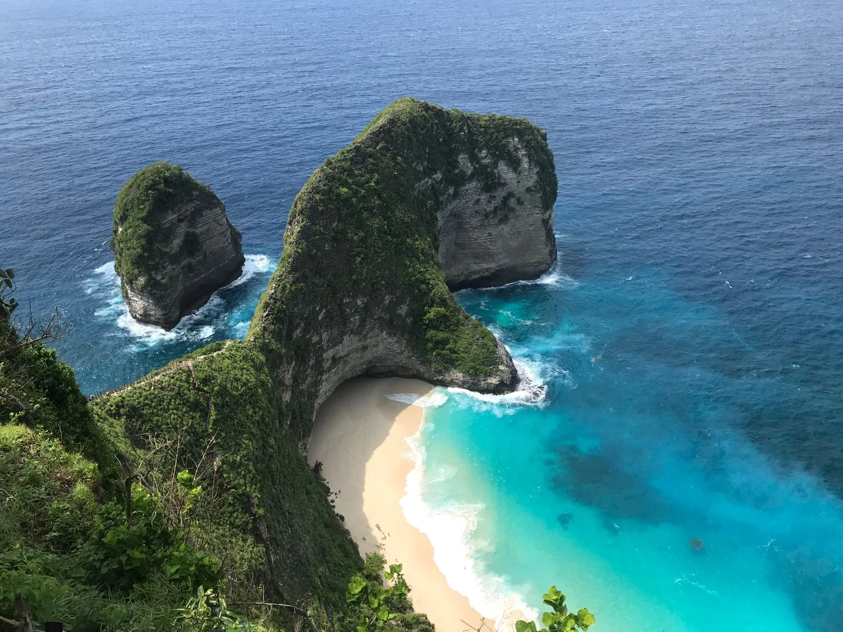Turquoise waters and limestone islands scattered across a remote Indonesian archipelago
